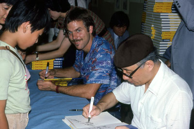 Signing books with Osamu Tezuka, 1983